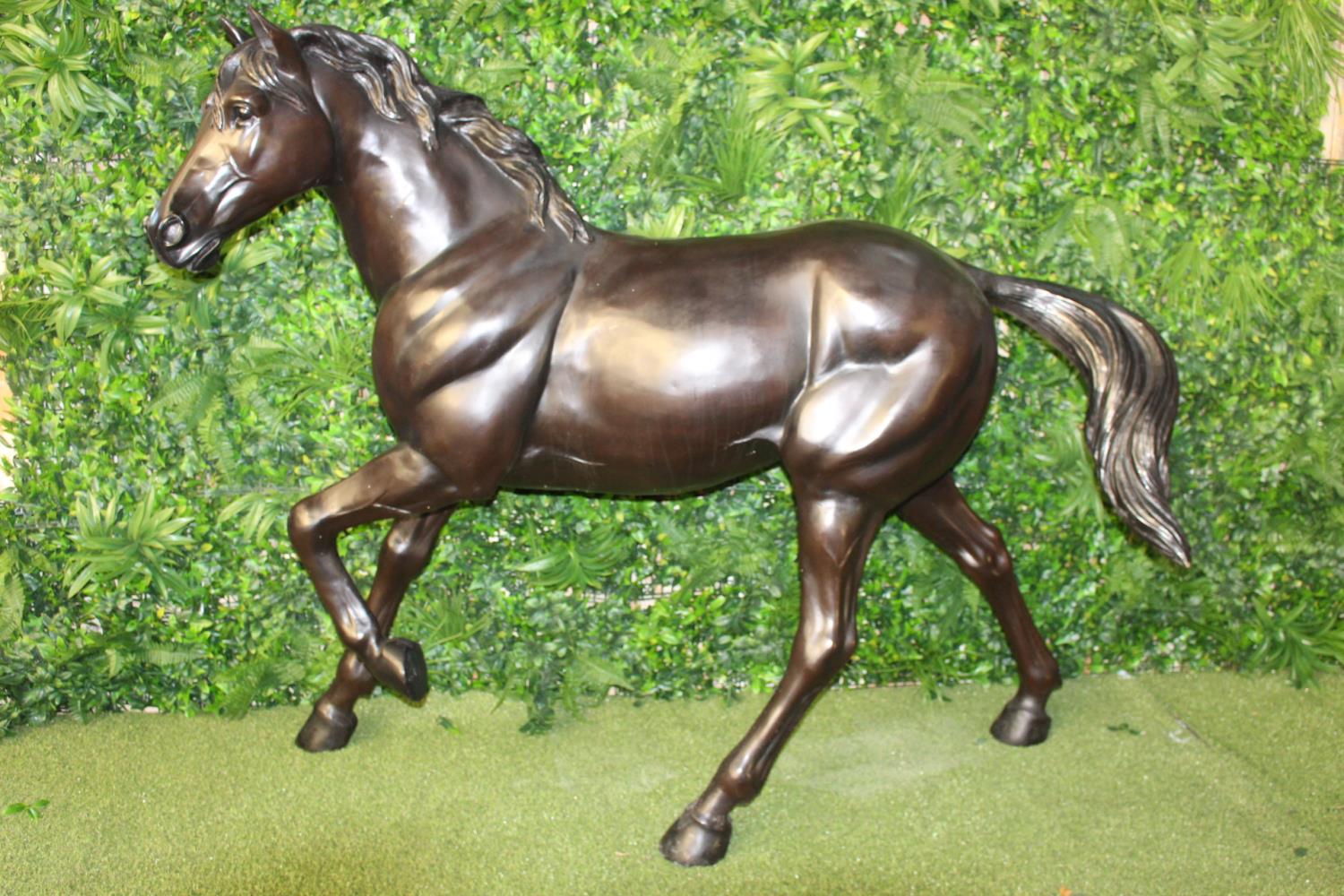 Bronze model of a trotting Horse.