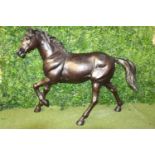 Bronze model of a trotting Horse.