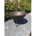 Wrought iron fire pit on stand