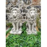 Pair of moulded stone seated Lions.