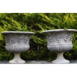 Pair of decorative sandstone urns