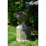 Stone urn on hexagon pedestal