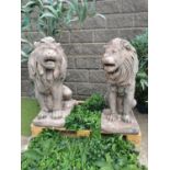 Good quality pair of moulded stone seated Lions .