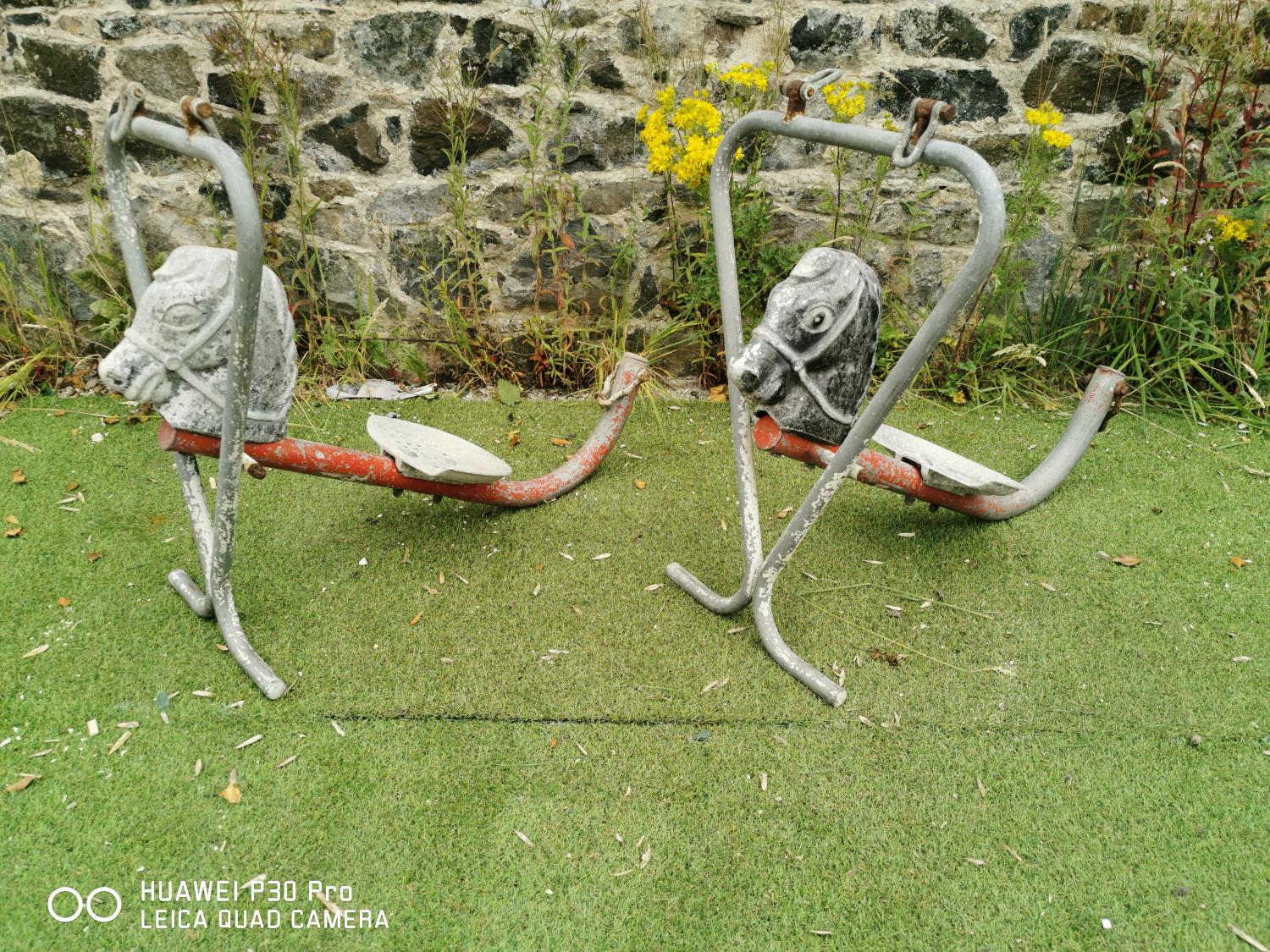 Pair of 1950s alloy children's Merry-Go-Round rides.