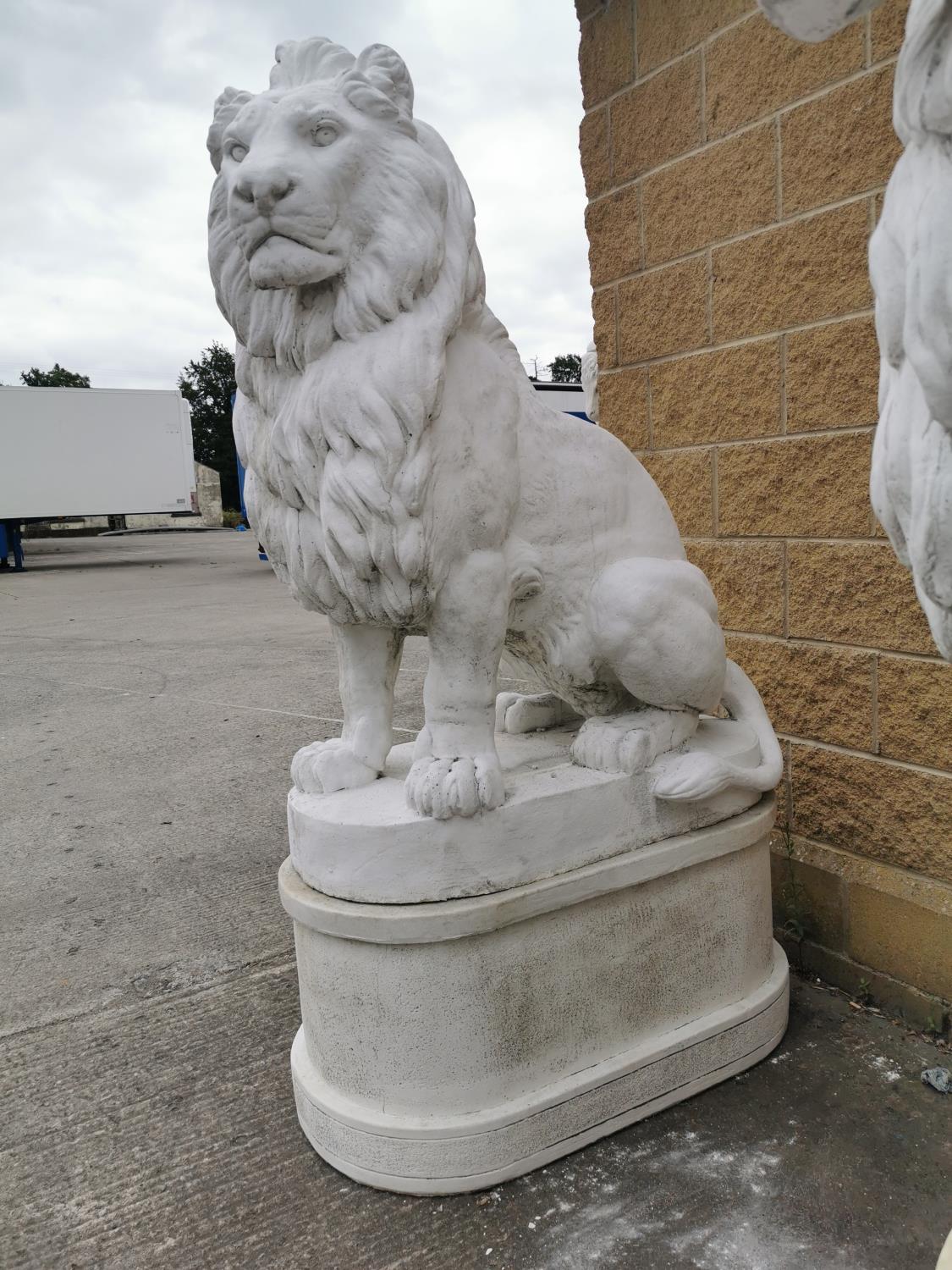 Pair of moulded stone seated Lions on pedestals. - Image 2 of 3