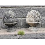Pair of polystone finials in the form of acorns.