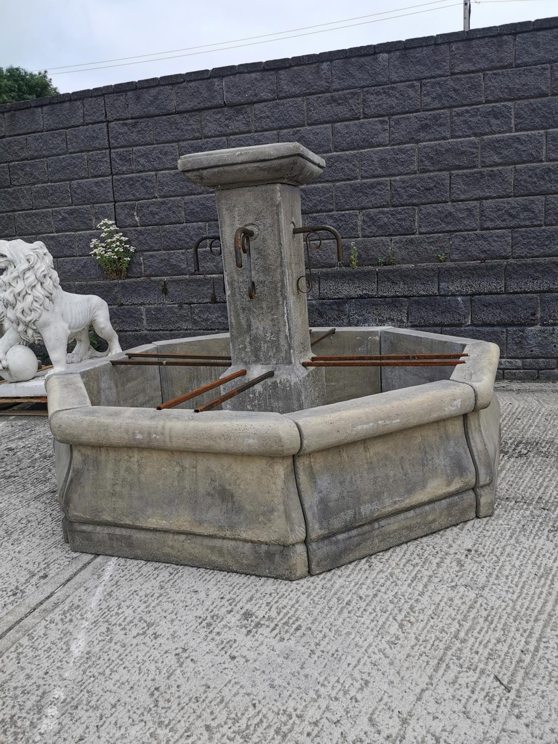 Moulded stone Portuguese fountain with surround.