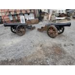 Pair of cast iron cannons.