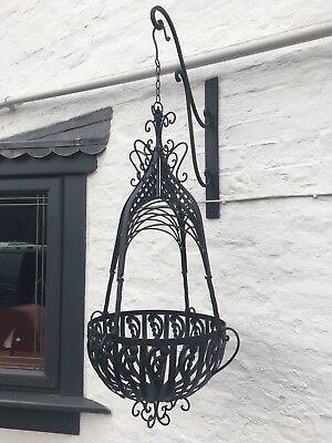 Pair of cast hanging baskets