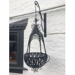 Pair of cast hanging baskets