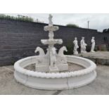 Moulded stone fountain and surround.