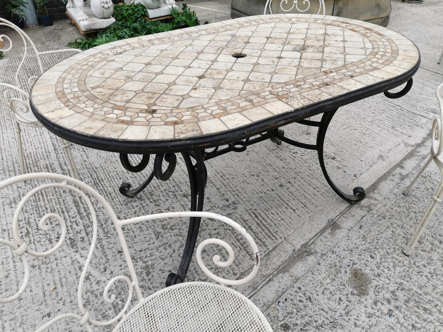 Wrought iron garden table and four chairs. - Image 2 of 4