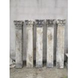 Set of five resin Corinthian columns.