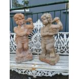 Pair of 19th. C. terracotta cherubs