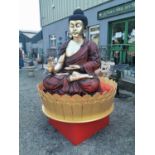 Large resin model of seated Buddha