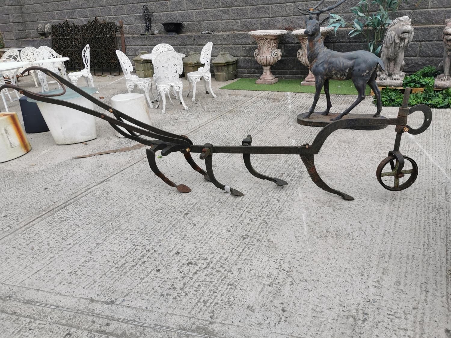 Early 20th C. wrought iron Grubber.