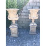 Large pair of composite stone urns