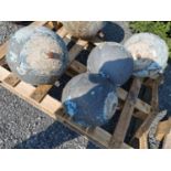 Four 18th C. limestone balls.