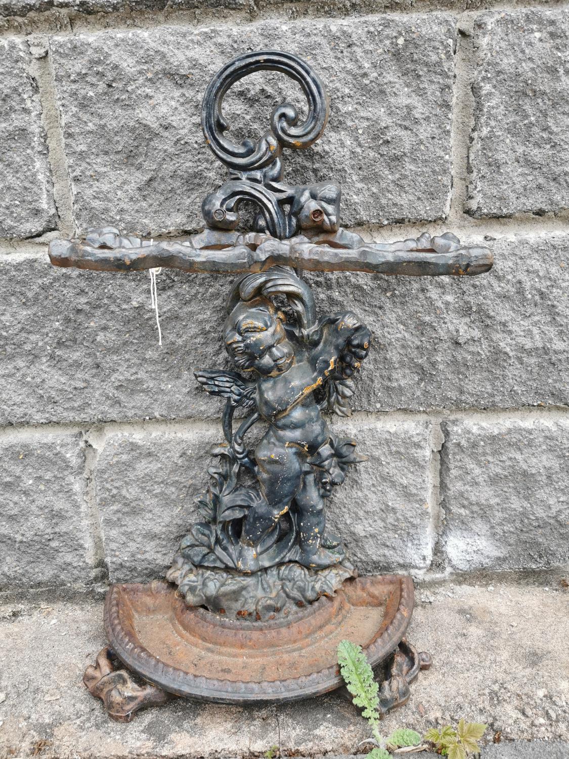 Decorative cast iron stick stand.