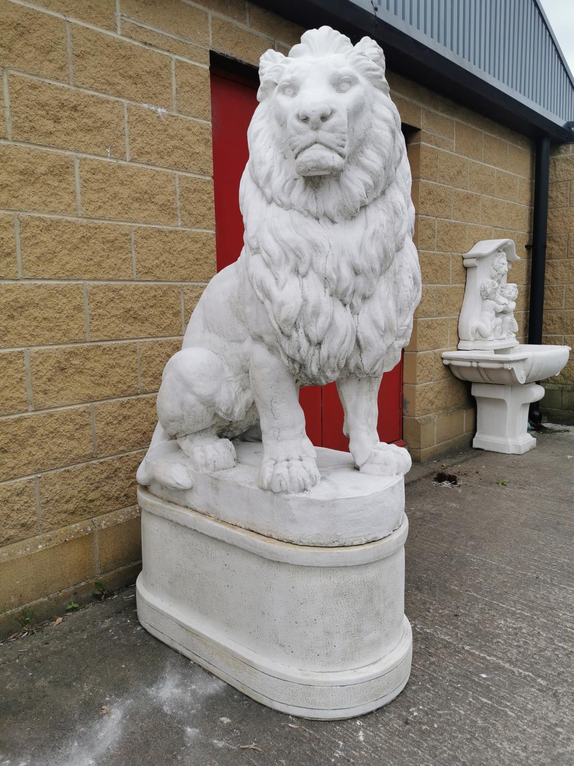 Pair of moulded stone seated Lions on pedestals. - Image 3 of 3