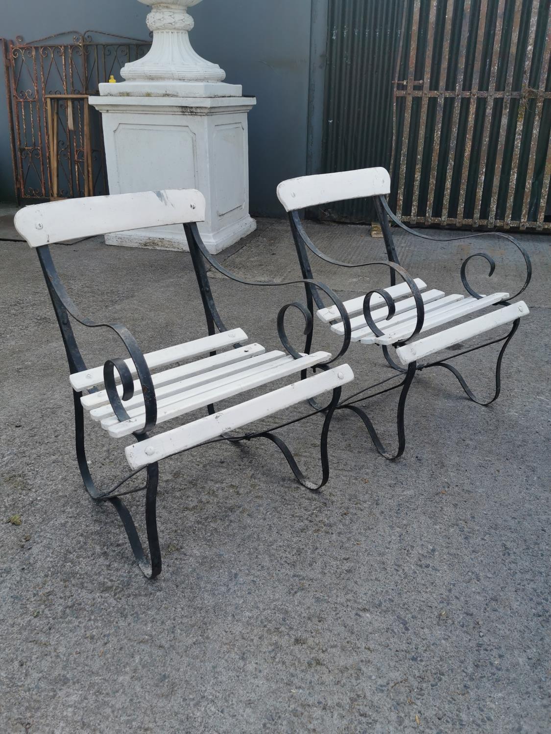 Pair of early 20th C. wrought iron and wooden garden chairs