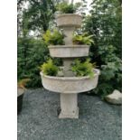 Unusual three tiered composition plant stand.