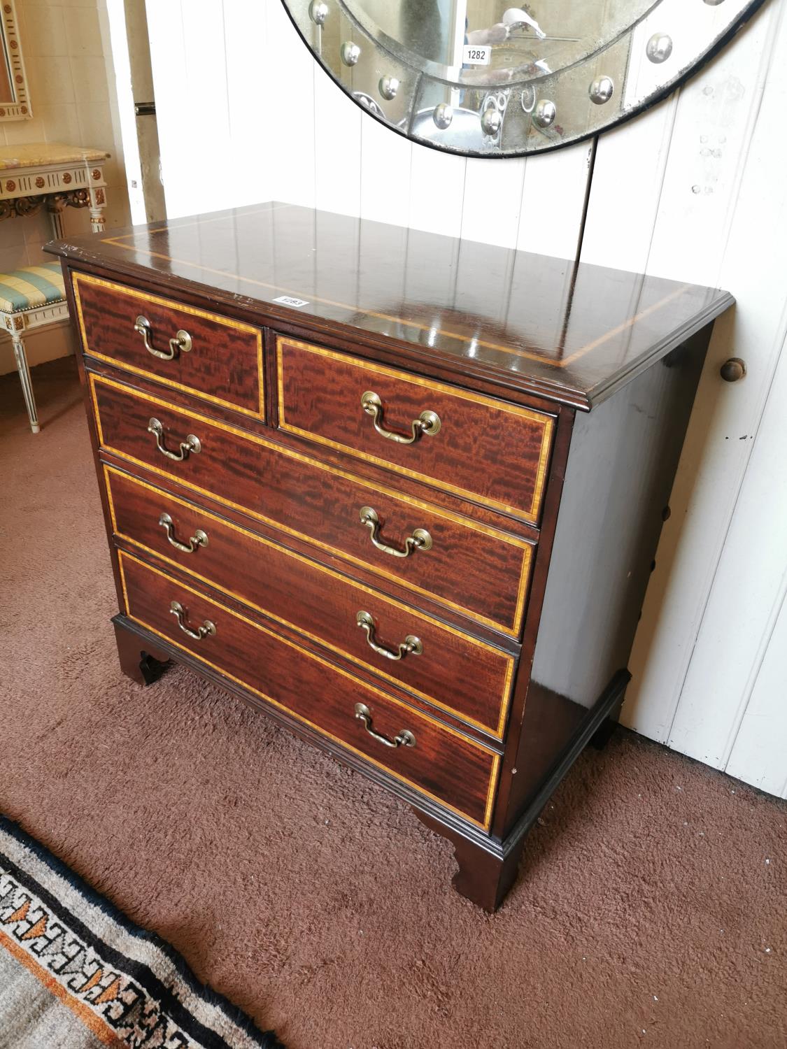 Mahogany and satinwood chest of drawers.