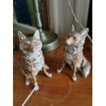 Pair of painted metal model of foxes