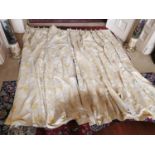 Pair of cream and gold curtains