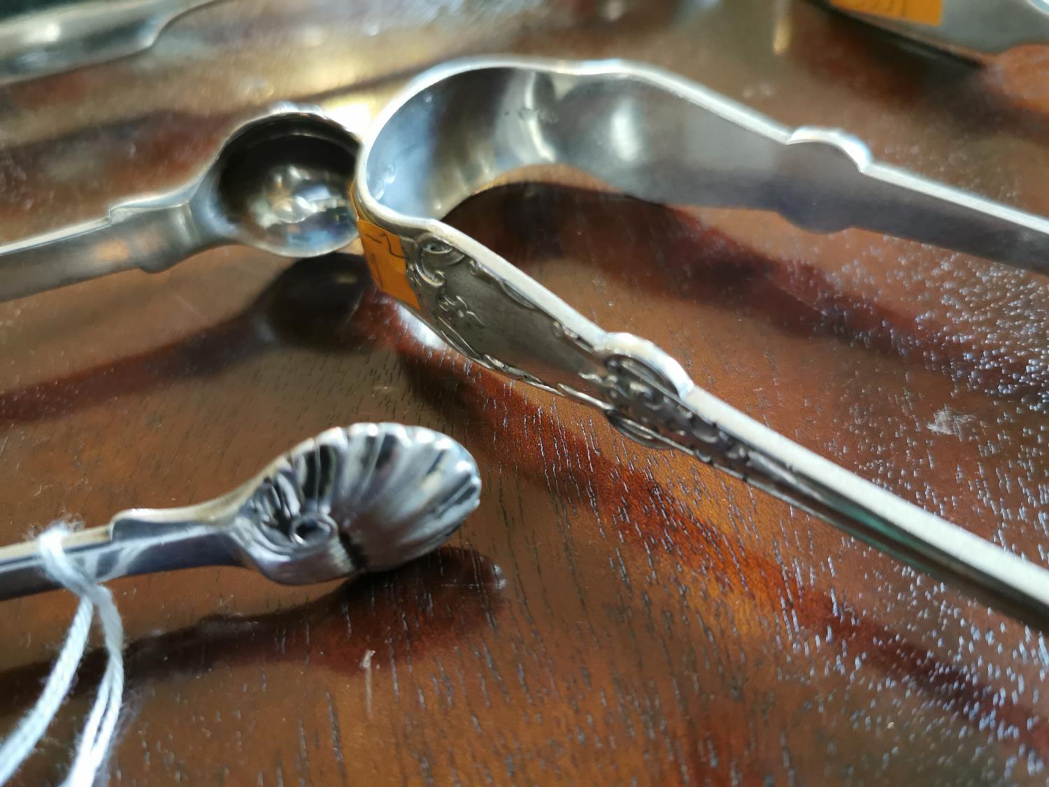 Four English silver sugar tongs - Image 2 of 2