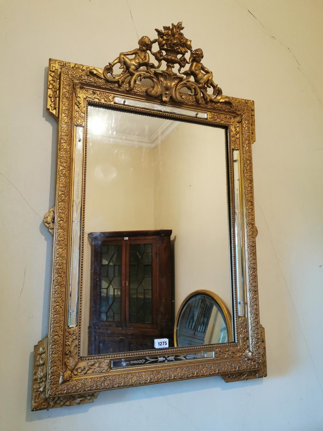 19th C. giltwood mirror decorated.