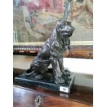 Bronze model of a seated dog