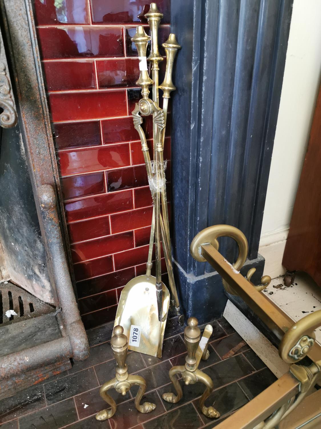 Edwardian set of brass fire irons and fire dogs.