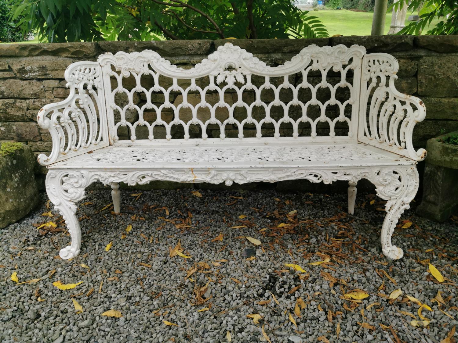 Cast iron bench in the Rocco style.