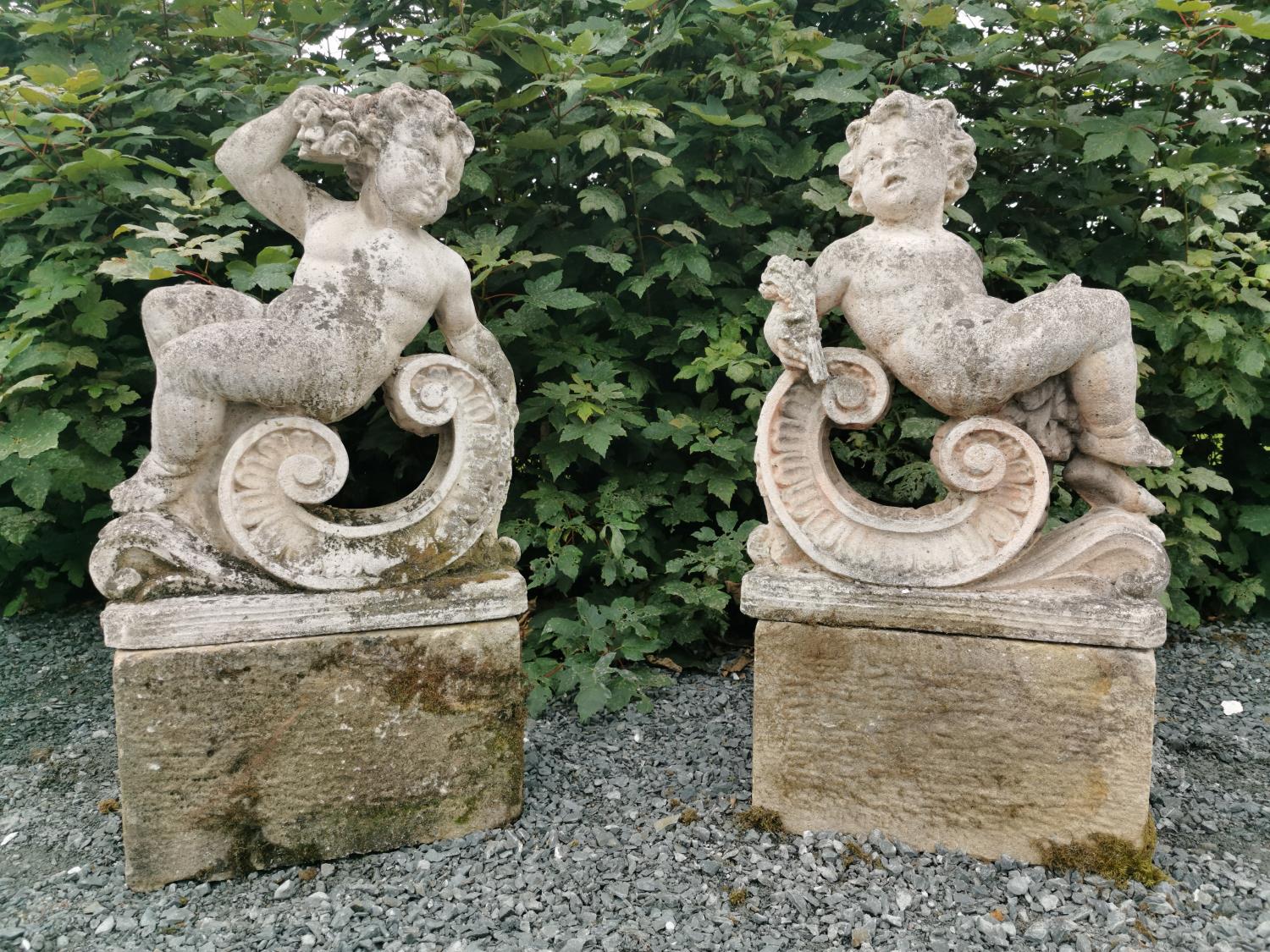 Pair of early 20th C. moulded stone Putti.