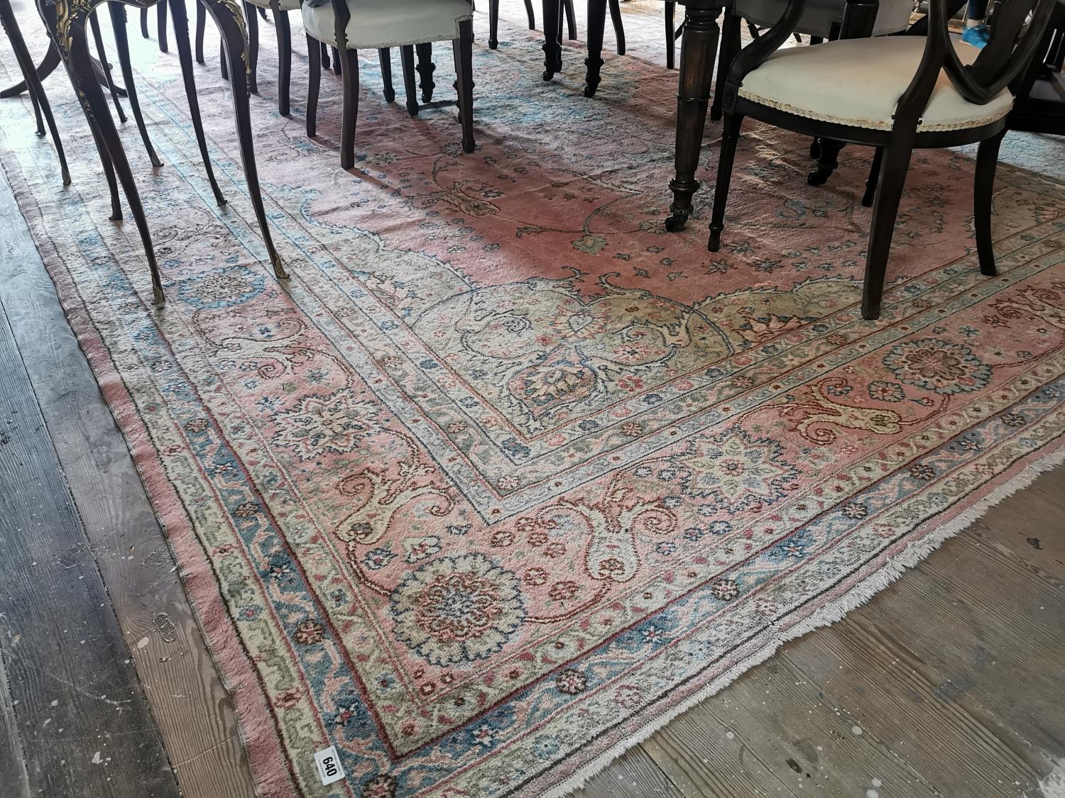 Large decorative carpet square.