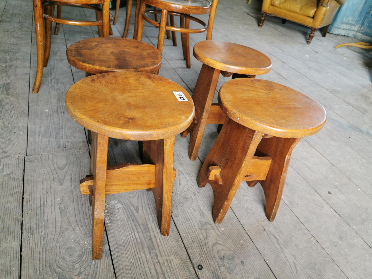 Set of four early 20th C. oak stools.