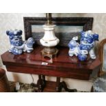 Two blue and white ceramic models of Dogs of Fu