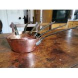 Set of six copper saucepans
