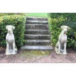Pair of good moulded stone models of dogs.