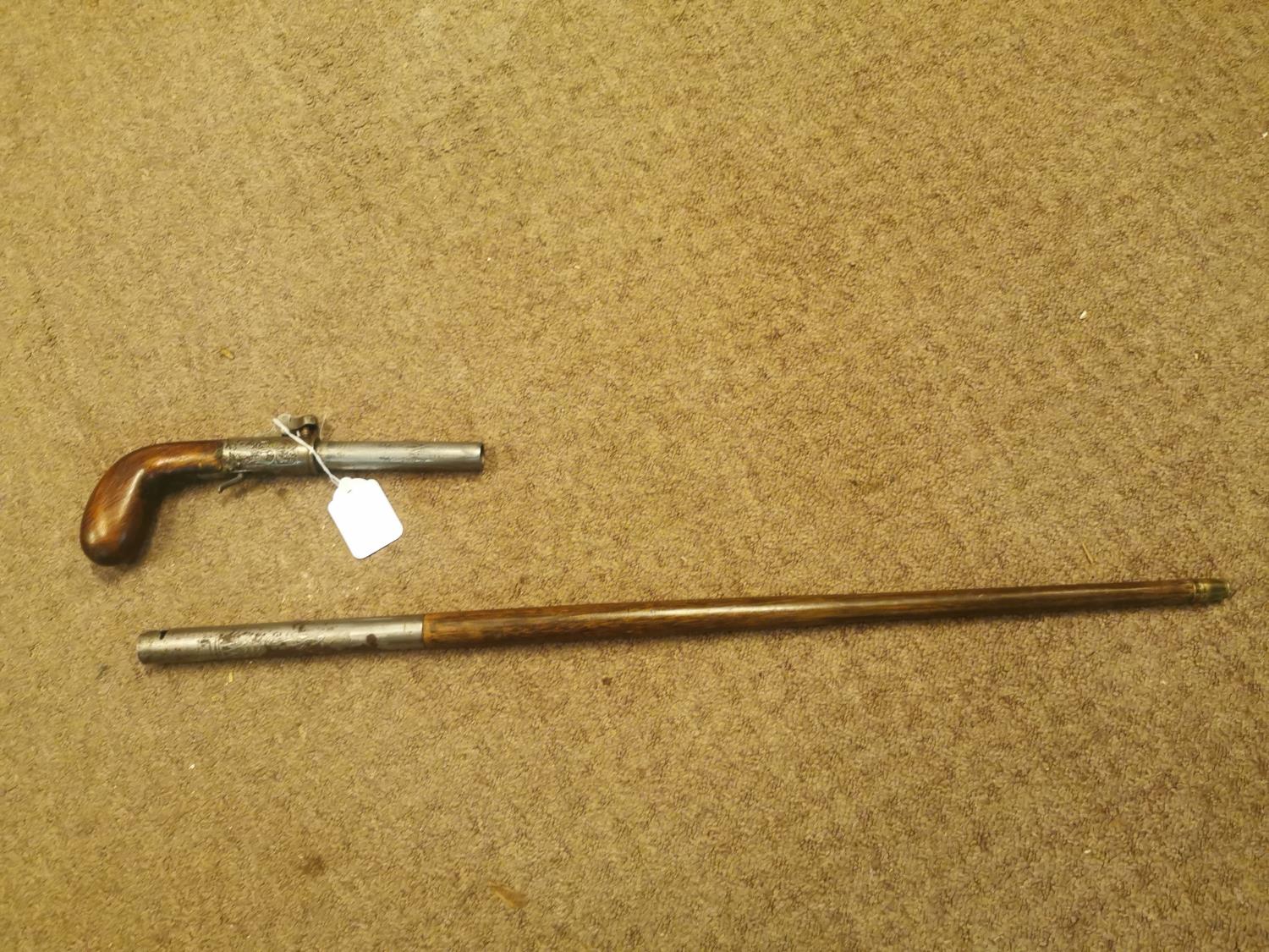 19th. C. mahogany and engraved metal gun stick