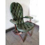 Mahogany and leather deep buttoned campaign style folding chair