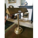 Brass desk lamp.