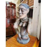 Carved wooden figurine of an African lady