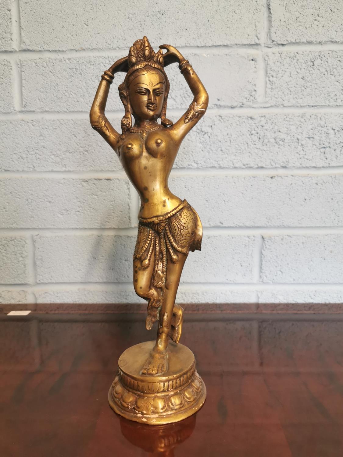 Oriental brass figure of a dancing lady.