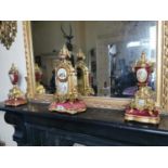19th. C. gilded metal three piece clock garniture