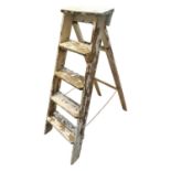 Early 20th. C. painted pine step ladders