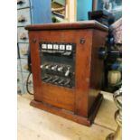 Early 20th. C. mahogany and Bakelite telephone switch board