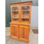 19th C. pitch pine two door book case.