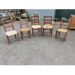 Five early 20th C. oak Sugan chairs.